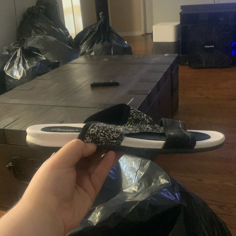 White and black flip flops